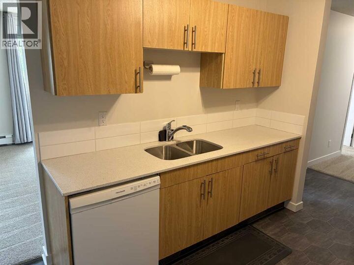 Property Photo:  85 Foxbend Crescent North  AB T1H 5T4 