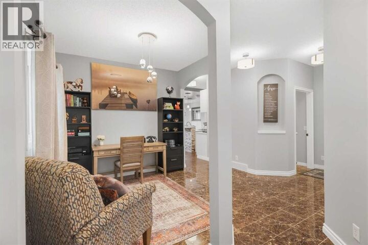 Property Photo:  126 Saddlecrest Way Northeast  AB T3J 5N2 