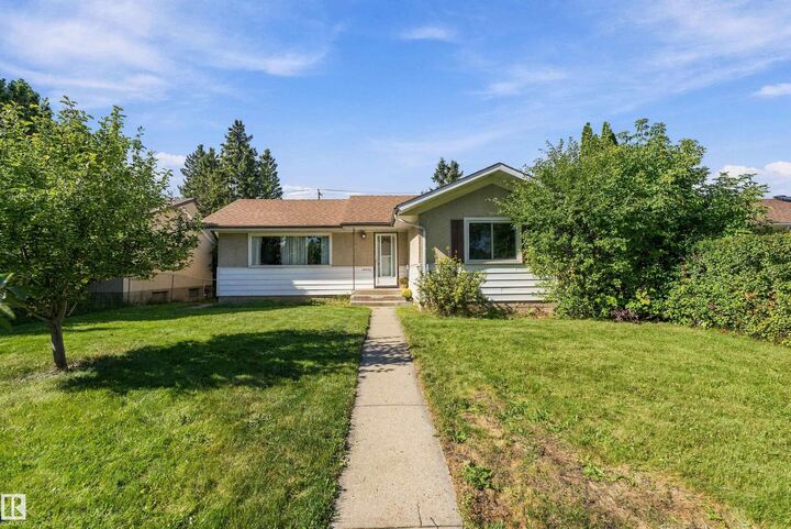 Property Photo:  10432 50 Street NW  AB T6A 2C6 
