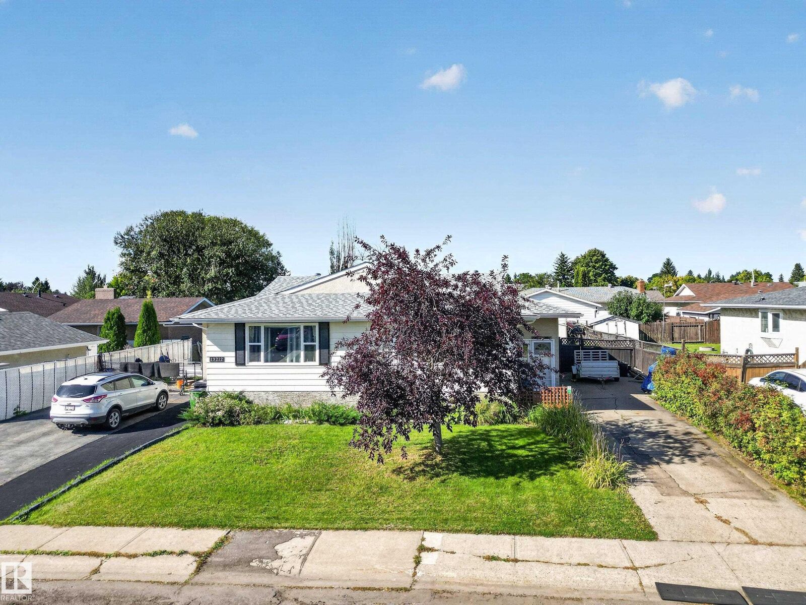 Property Photo:  13214 38 Street NW  AB T5A 3G4 