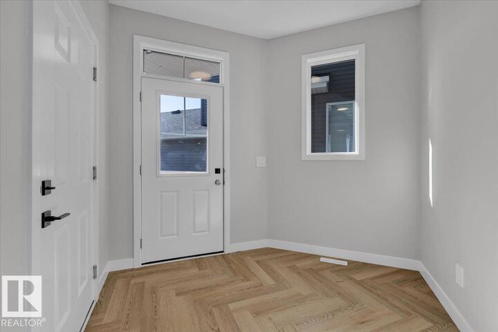 Property Photo:  8312 Kiriak Loop SW  AB T6W 5S2 