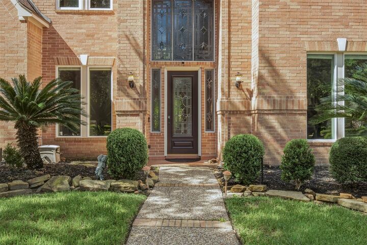 Property Photo: 16111 Wimbledon Forest Drive TX 77379