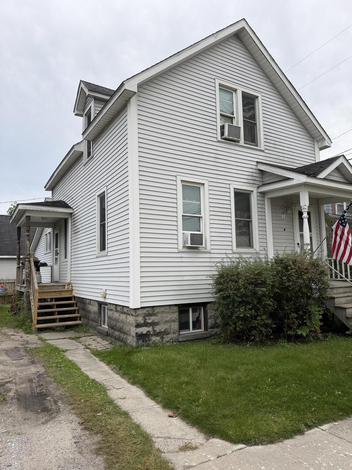 Property Photo:  210 S 7th Avenue  MI 49707 