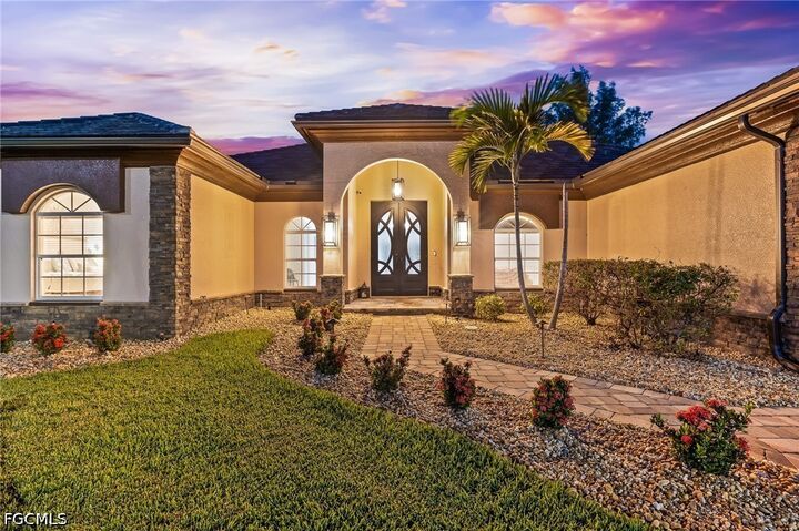 Property Photo:  3810 SW 19th Place  FL 33914 