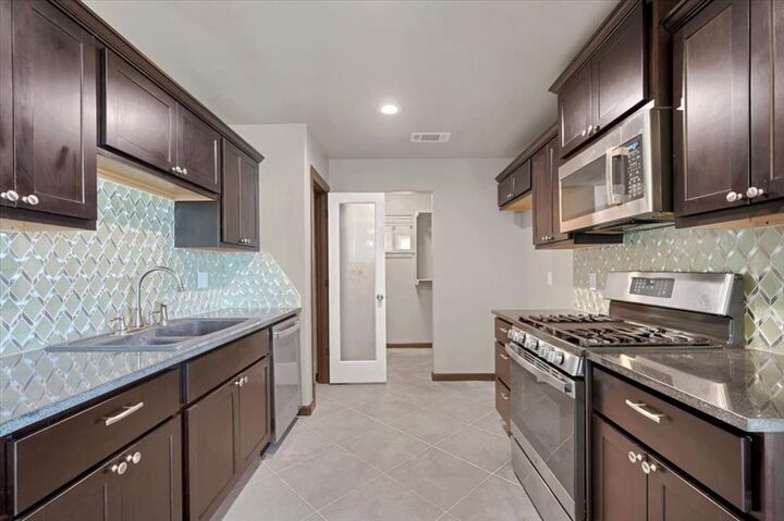 Property Photo:  1825 N Myers Terrace  OK 73141 