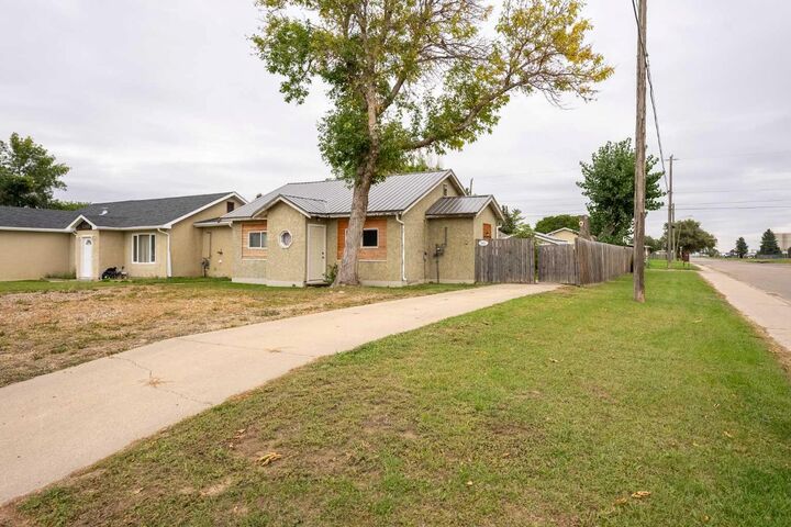 Property Photo:  5603 56 Street  AB T1G 1L4 