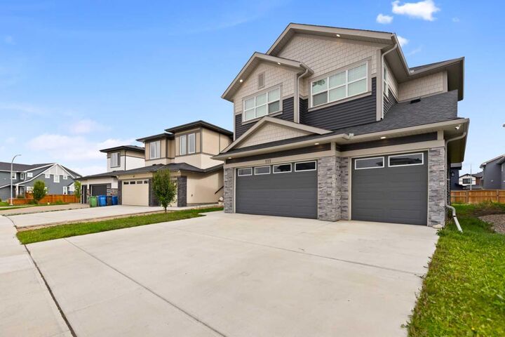Property Photo:  111 Sandpiper Park  AB T1X 1Y8 