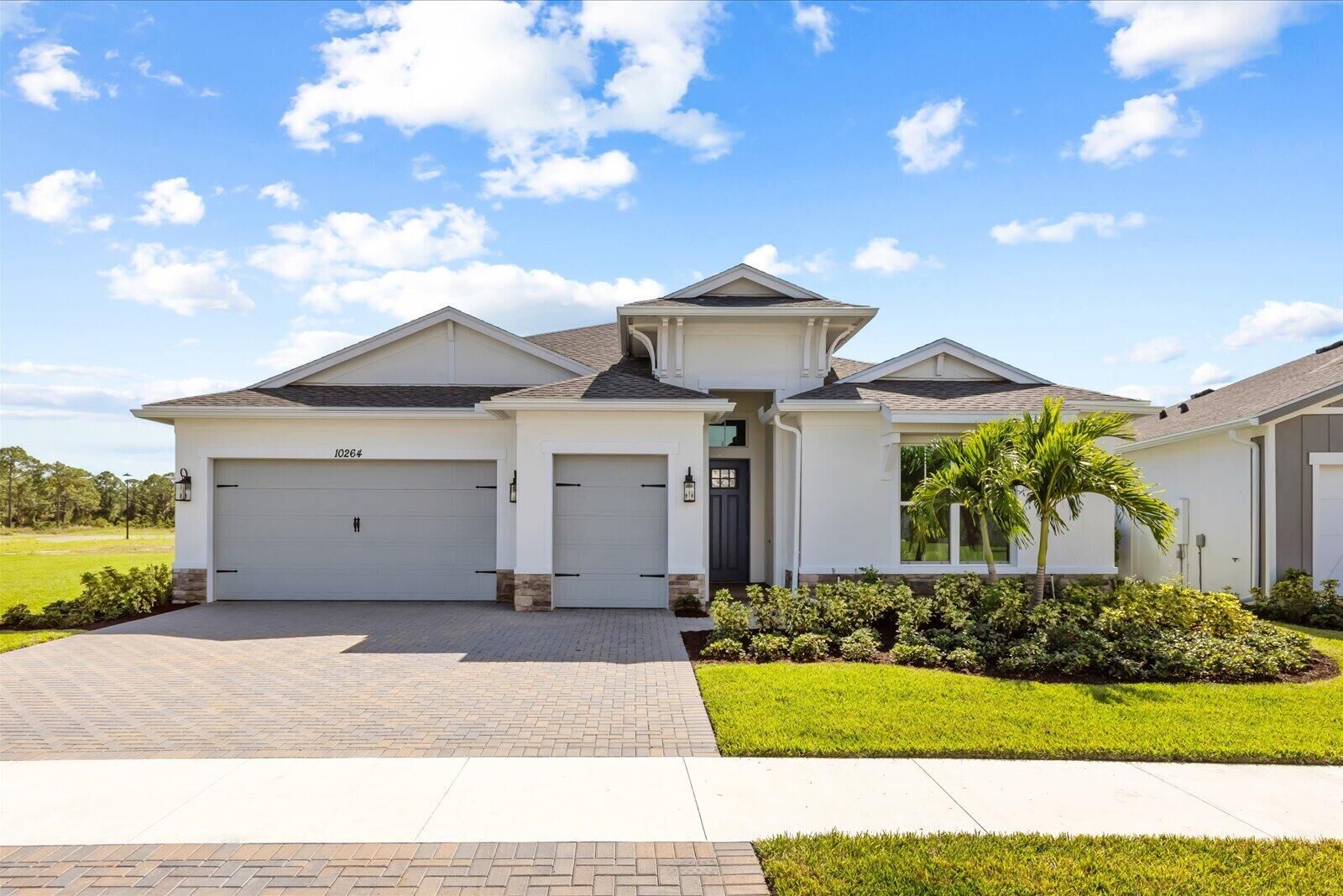 Property Photo: 10264 NW Field Flower Trail FL 34987