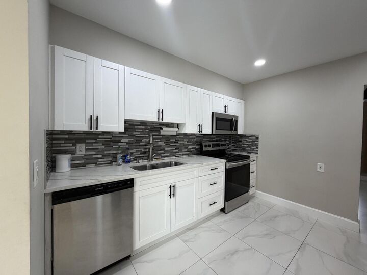 Property Photo:  1408 SE 3rd Terrace  FL 33441 