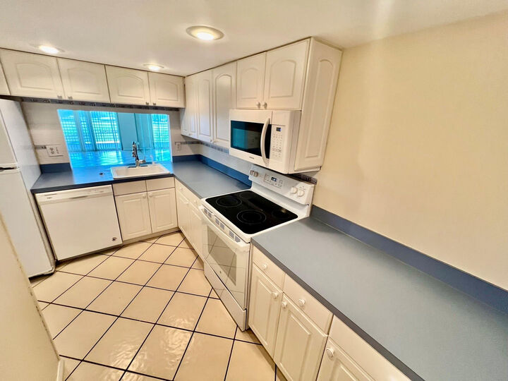 Property Photo:  9450 Poinciana Place 416  FL 33324 
