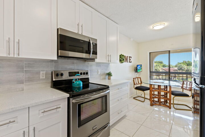 Property Photo: 5380 Cedar Lake Drive 304 FL 33437