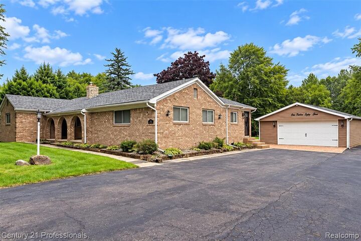 Property Photo:  1466 N Beck Road  MI 48187 