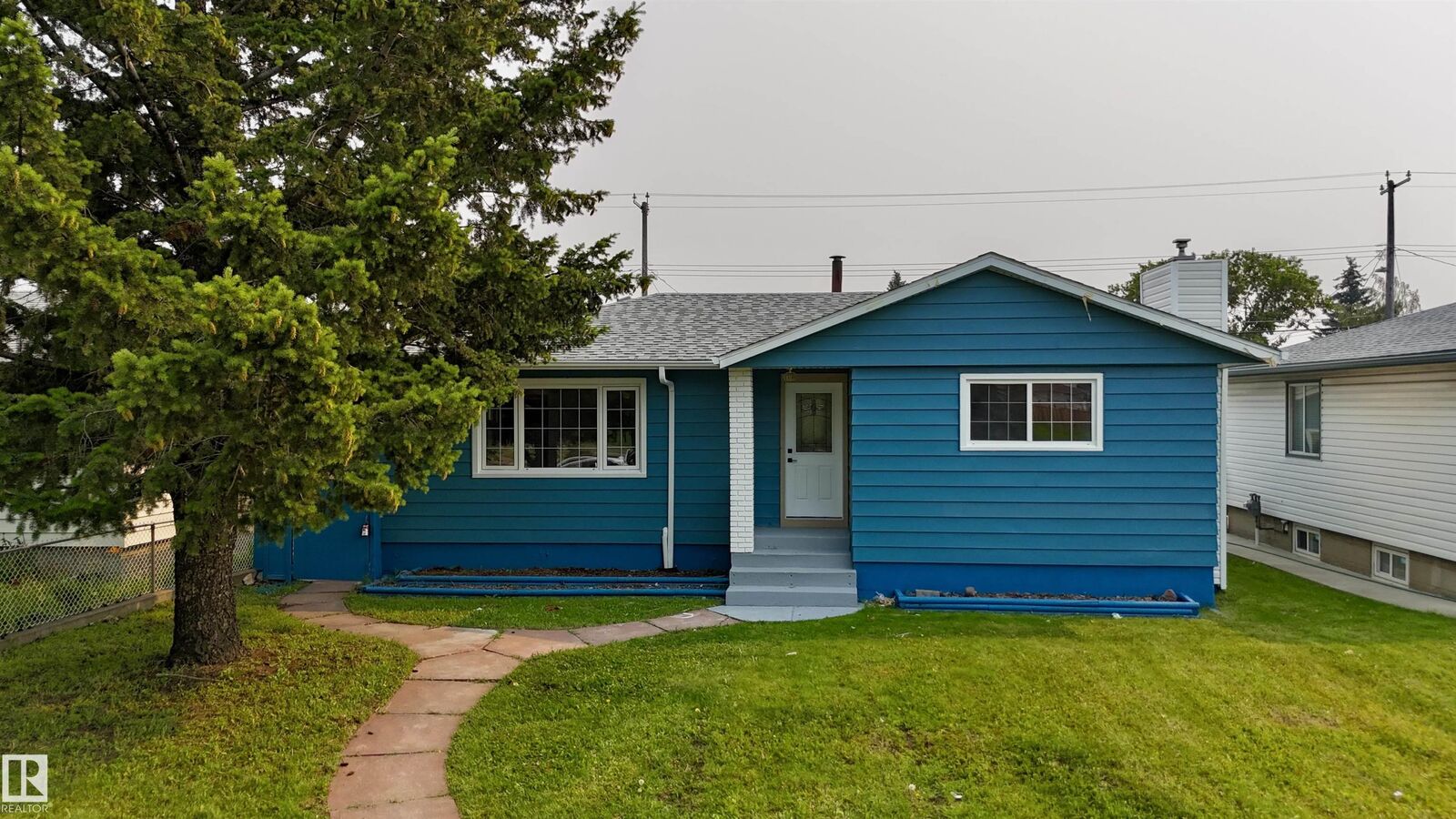 Property Photo:  12023 137 Avenue NW  AB T5E 1Z7 