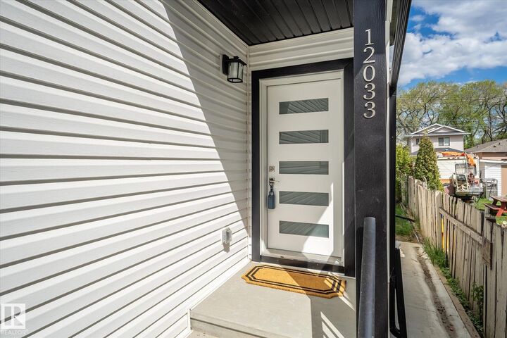 Property Photo:  12033 92 Street NW  AB T5G 1A8 