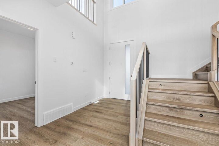 Property Photo: 25 Owl Rigde Close AB T8L 1Y4