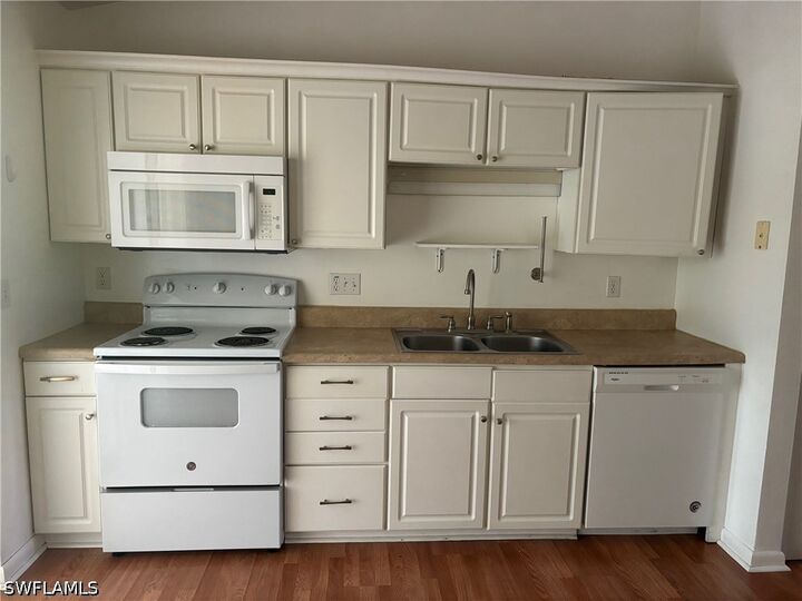 Property Photo:  5386 16th Place SW F-4  FL 34116 