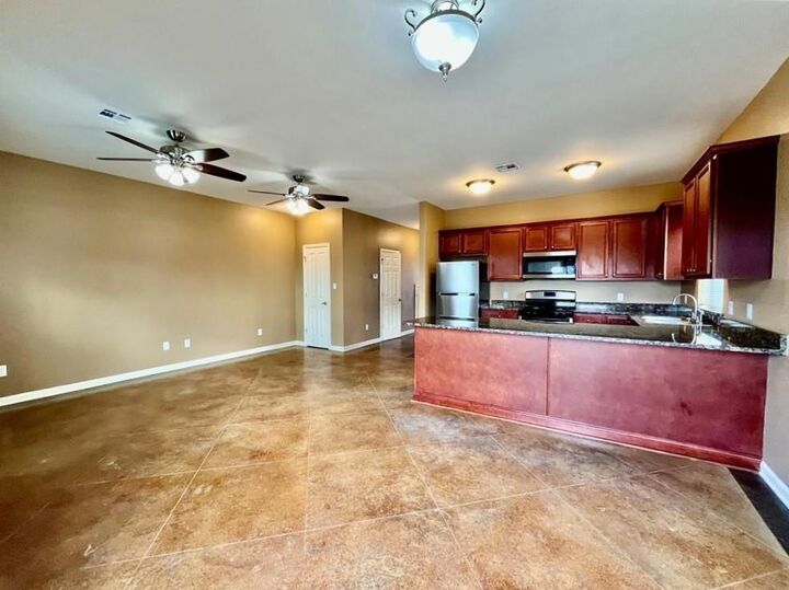 Property Photo:  128 E Third Street A  LA 70037 