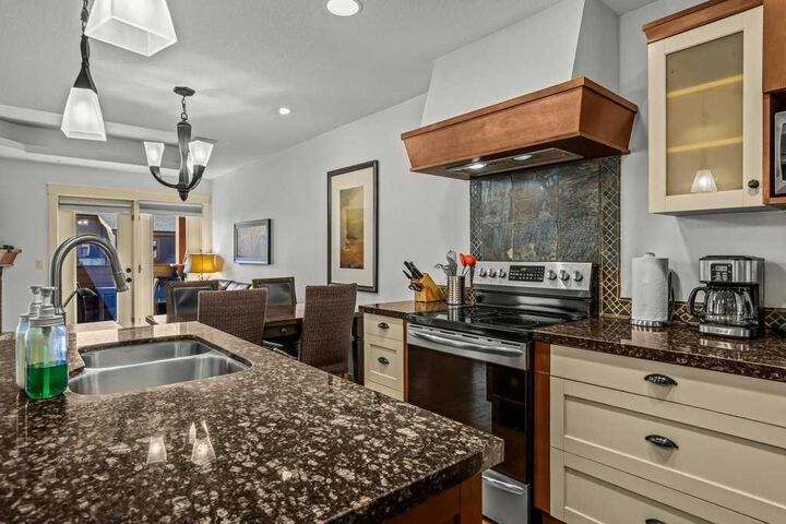 Property Photo:  173 Kananaskis Way 310ab  AB T1W 0A8 