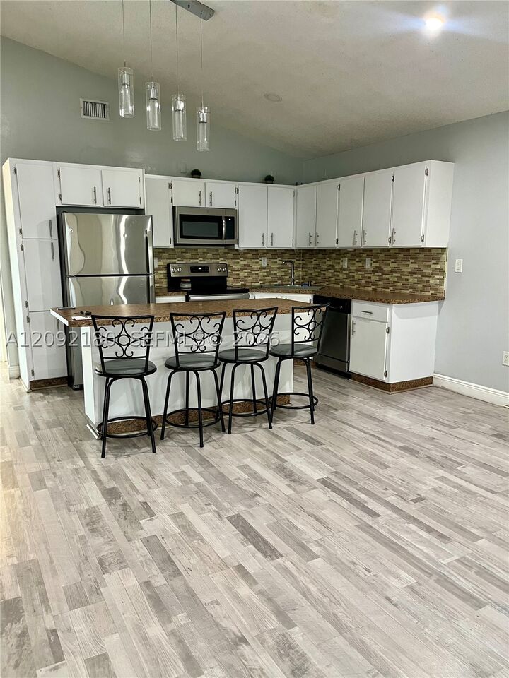 Property Photo:  11512 SW 6th St  FL 33174 