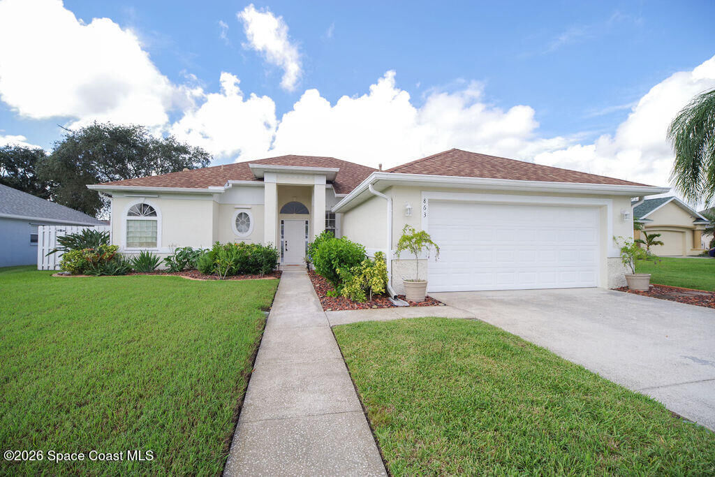 Property Photo: 863 Coopers Hawk Court FL 32955