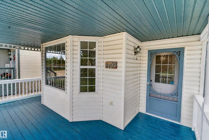Property Photo:  4409 150 Avenue NW  AB T5Y 2Z8 
