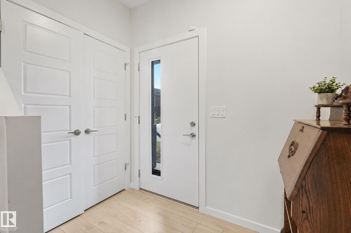 Property Photo:  2497 Kelly Circle Circle SW  AB T6W 4K2 