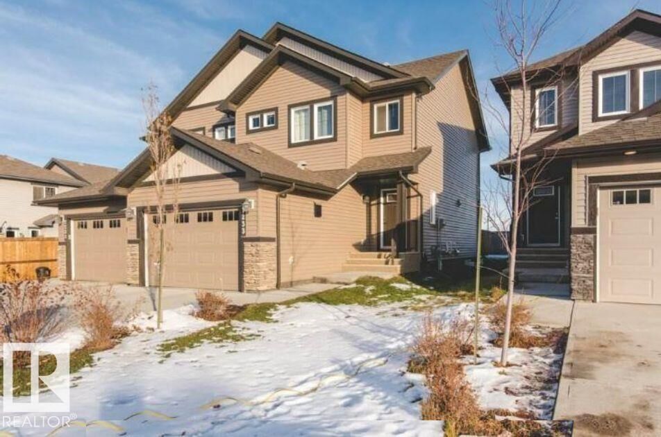 Property Photo:  7233 Armour Crescent SW  AB T6W 2S1 
