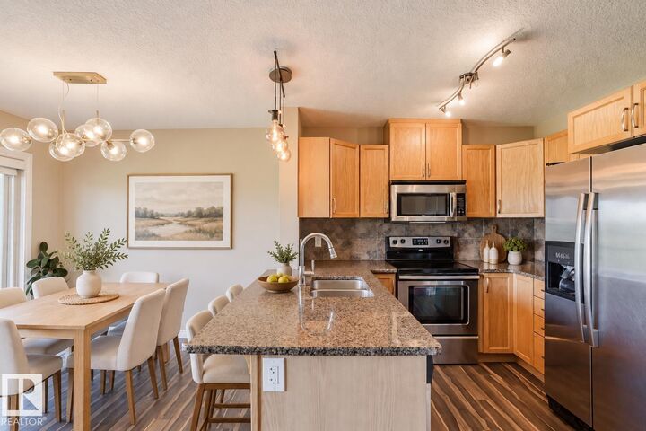 Property Photo: 5420 Grant Macewan Boulevard 106 AB T9E 0M1