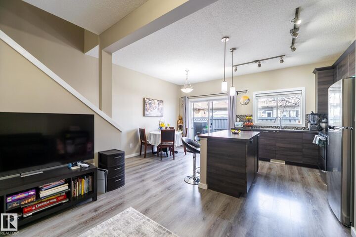Property Photo:  3710 Allan Drive SW 4  AB T6W 2C4 