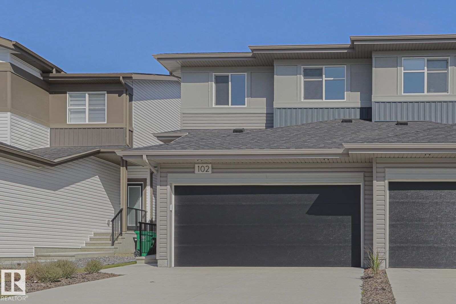 Property Photo:  102 Royal Street  AB T8N 7X4 