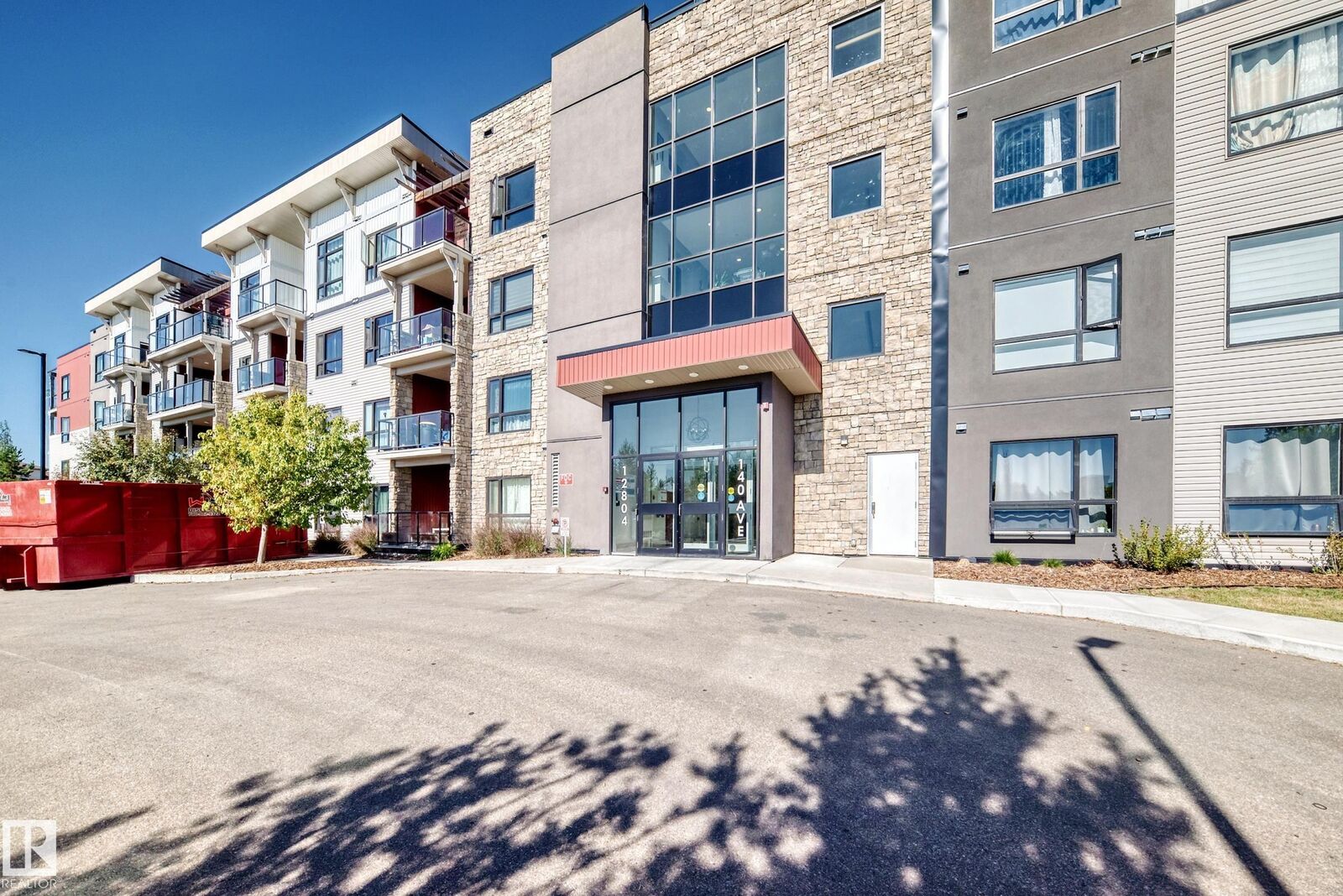 Property Photo:  12804 140 Avenue NW 404  AB T6V 0M3 