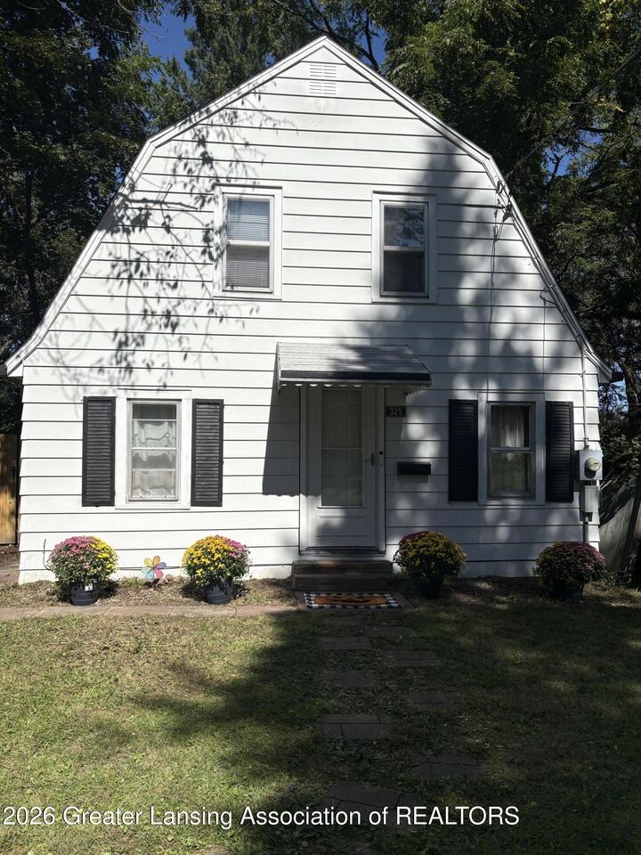 Property Photo:  325 Cox Boulevard  MI 48910 