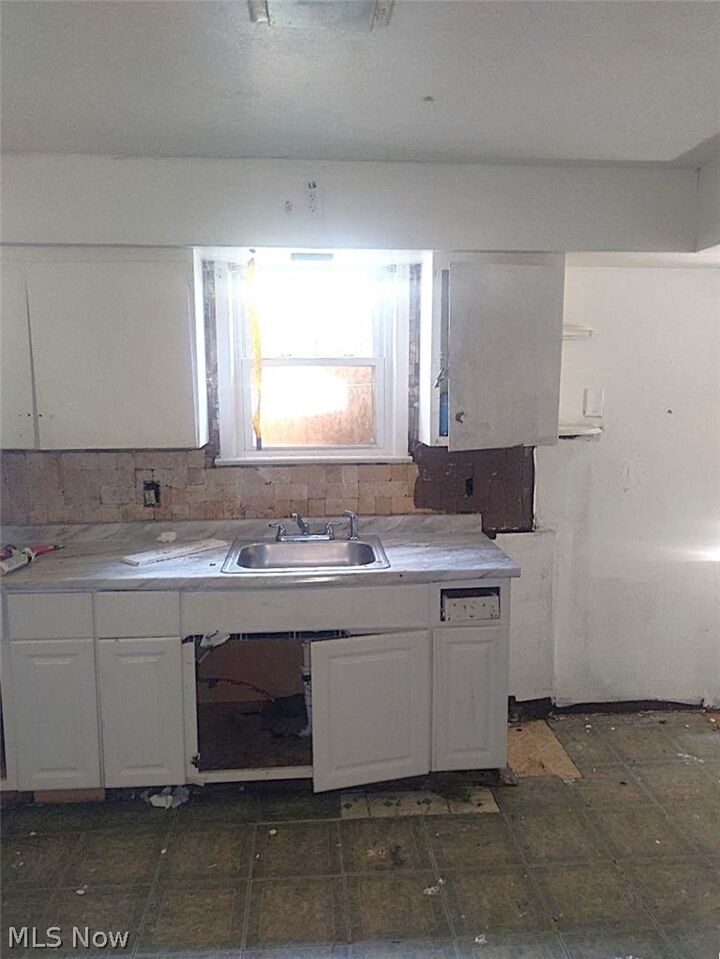Property Photo:  7404 Wentworth Avenue  OH 44102 