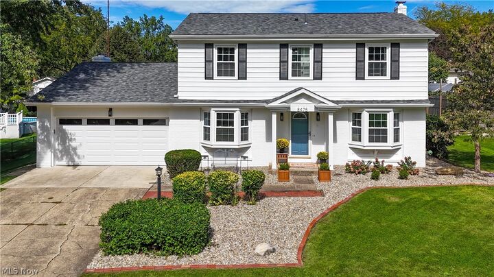 Property Photo: 8475 Squirrel Hill Drive NE OH 44484