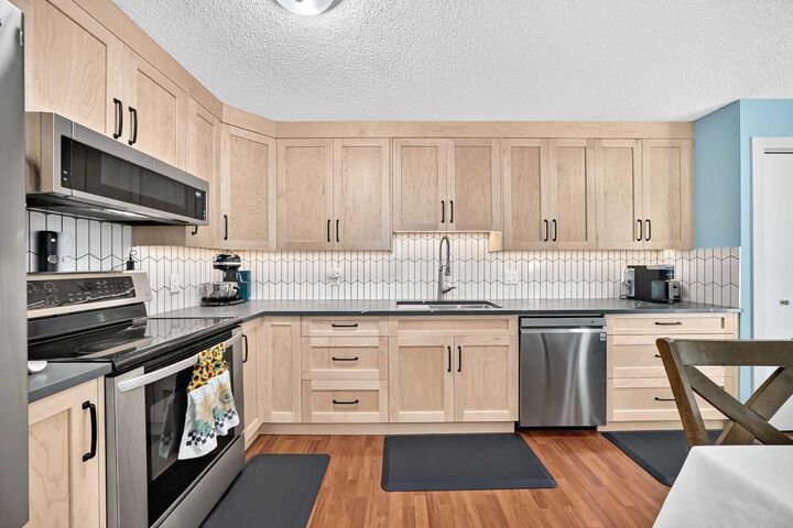 Property Photo:  44 McKinley Road SE  AB T2Z 1T6 