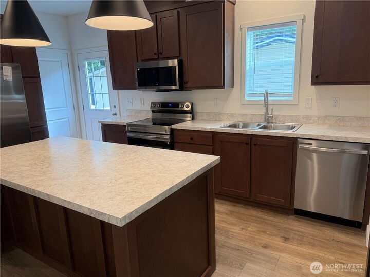 Property Photo:  375  Union Avenue SE 68  WA 98059 