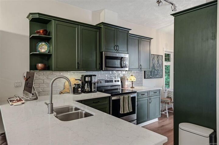 Property Photo:  930 Braidwood Rd #213  BC V9N 3R9 