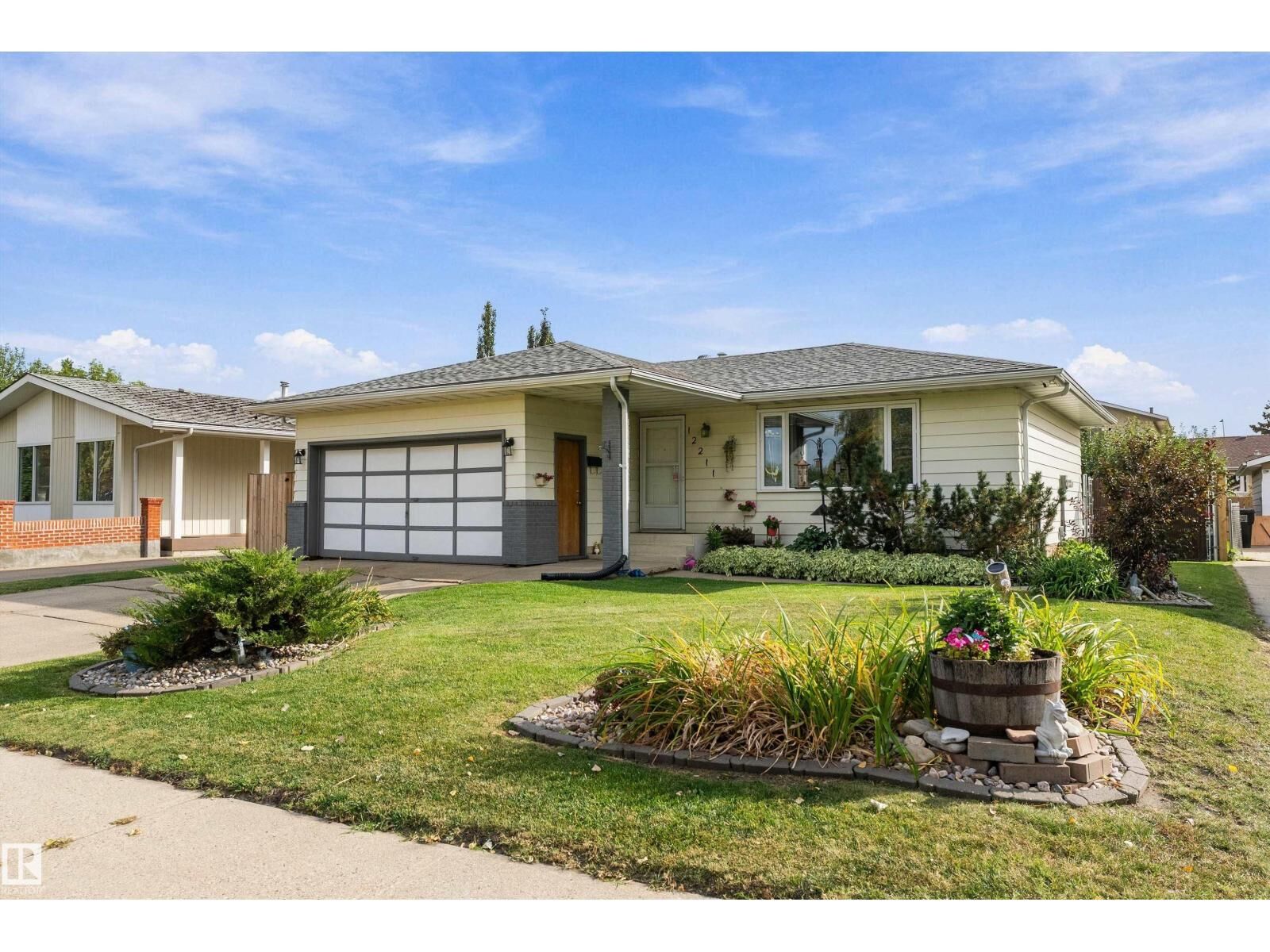 Property Photo:  12211 147 Av NW  AB T5X 1V4 