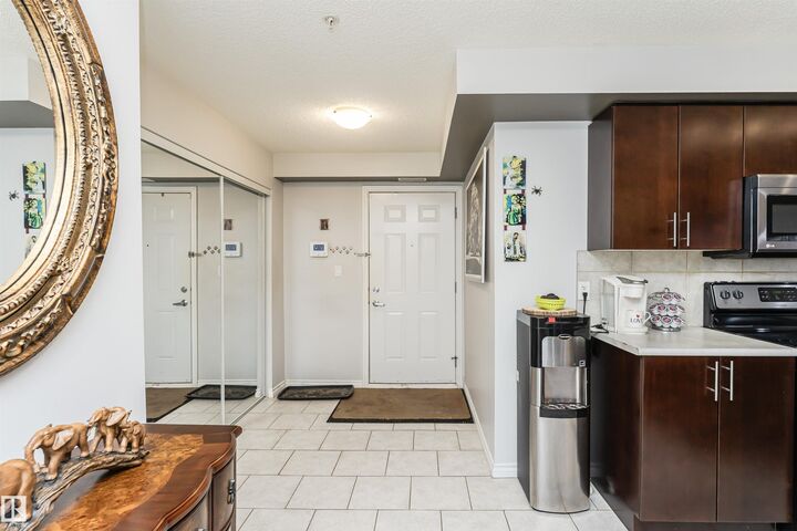 Property Photo:  10118 106 Avenue NW 107  AB T5H 0B8 