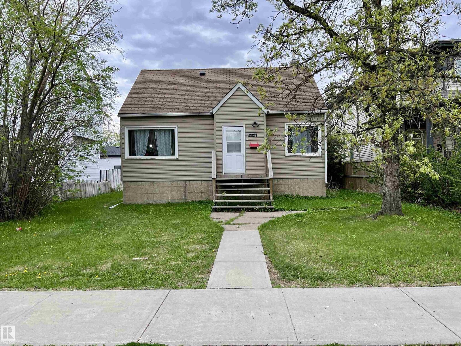 Property Photo:  12027 124 Street NW  AB T5L 0M8 