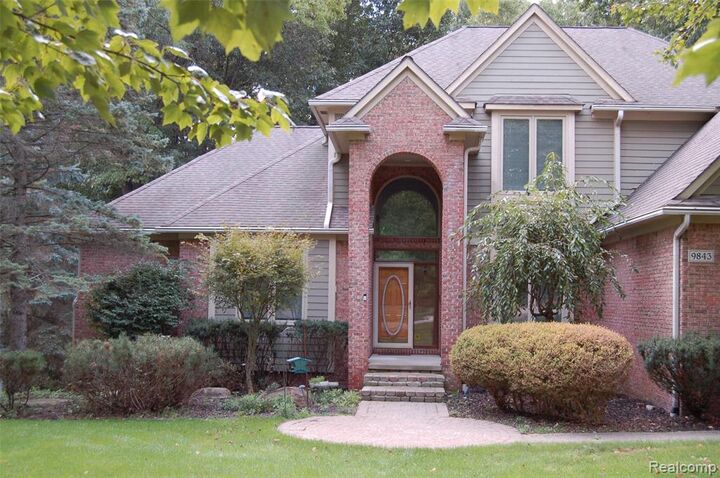Property Photo: 9843 Creekwood Trail MI 48350 2057