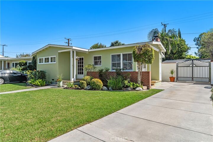 Property Photo:  5820 E Pavo  CA 90808 