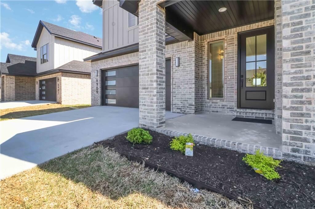 Property Photo:  6909 SW Basswood Avenue  AR 72713 