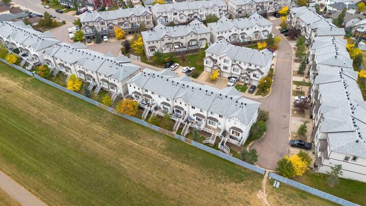 Property Photo: 240 Laffont Way 38 AB T9K 2W2