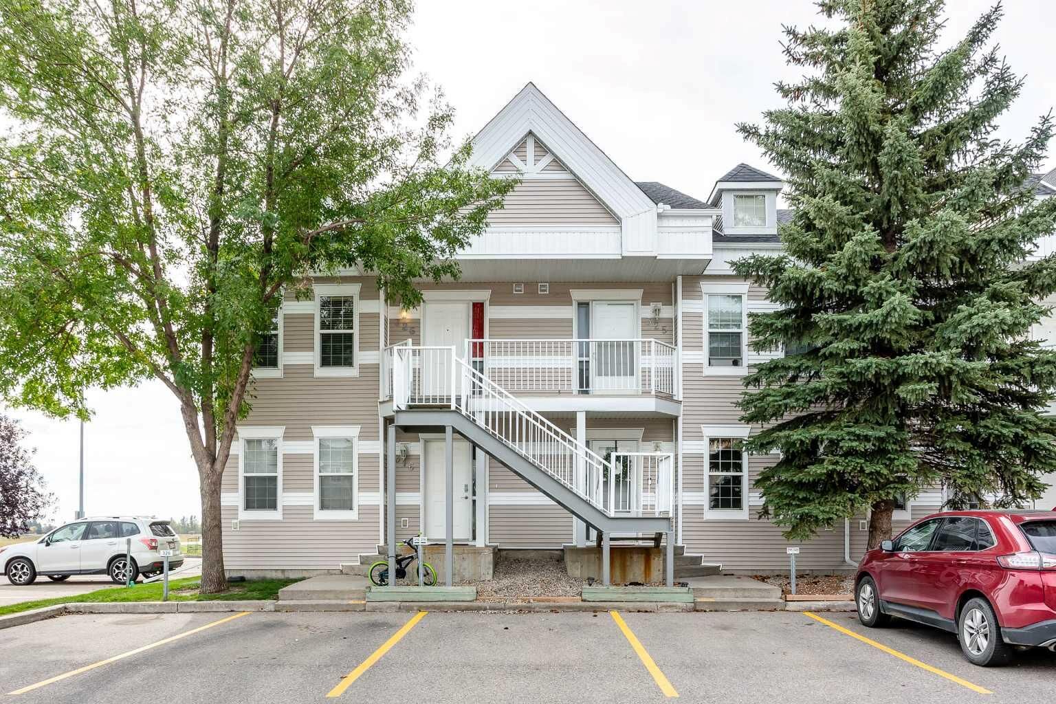 Property Photo:  103 Strathaven Drive 315  AB T1P 1W3 