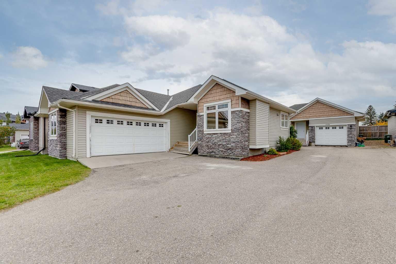 Property Photo:  115 Strathmore Lakes Common  AB T1P 1Y7 