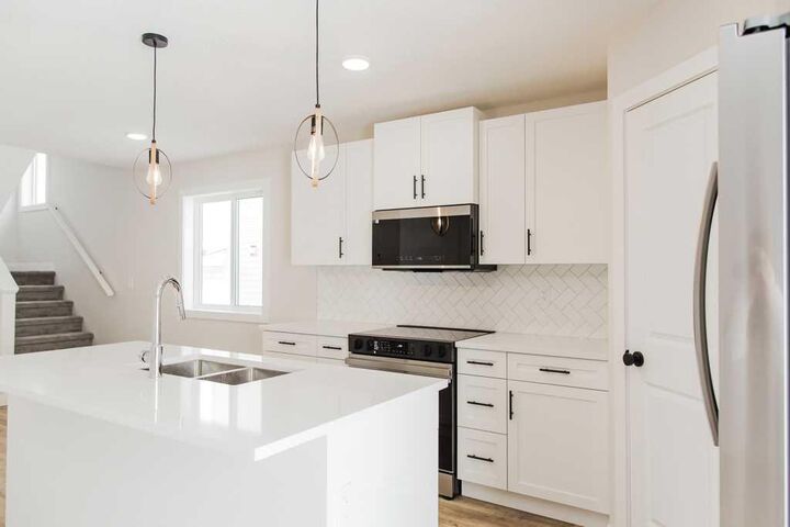 Property Photo:  11407 95 Street  AB T8X 0W9 