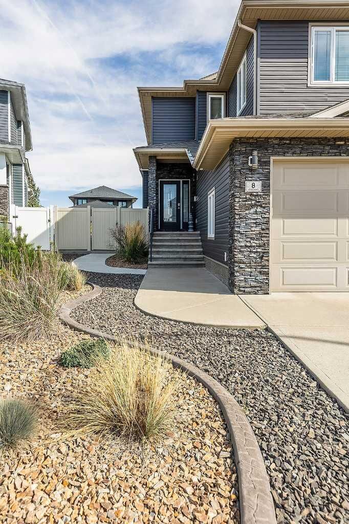 Property Photo:  8 Hamptons Crescent SE  AB T1B 0N7 