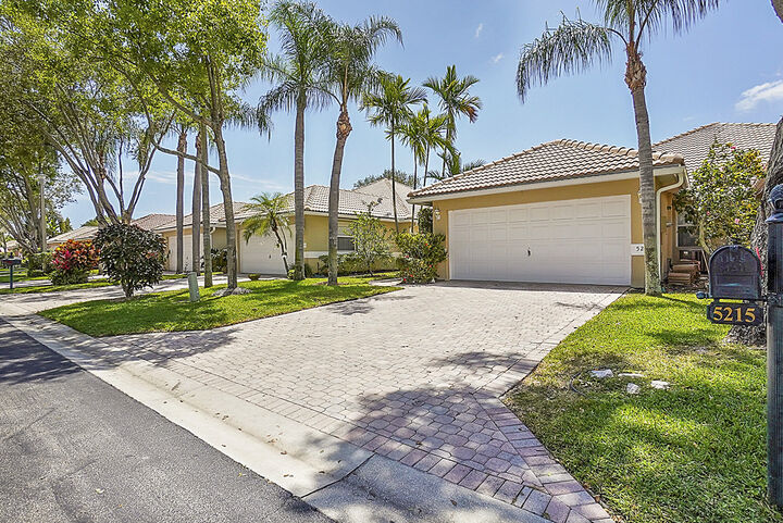 Property Photo:  5215 Grande Palm Circle  FL 33484 