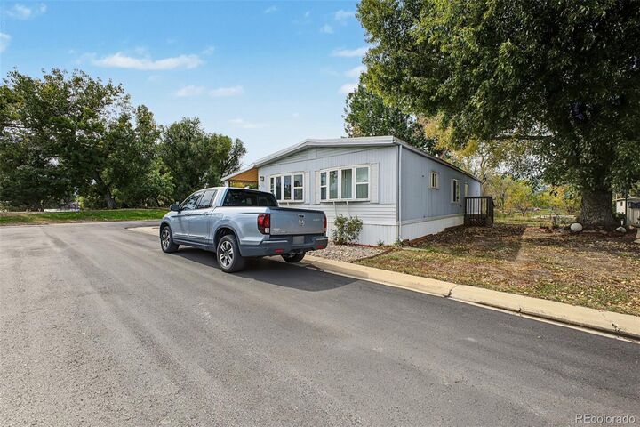 Property Photo:  8201 S Santa Fe Drive  CO 80120 